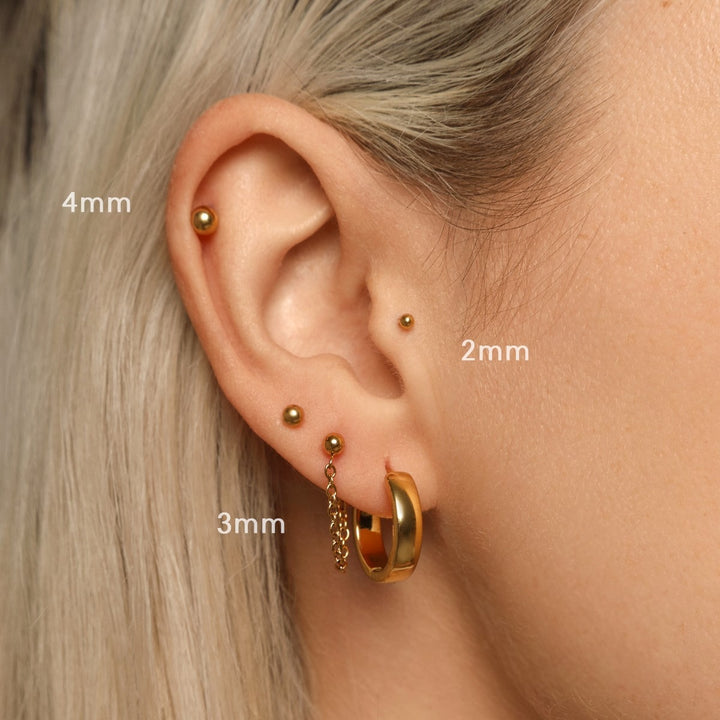 Dezentes Piercing mit Kugel Titan 18K vergoldet